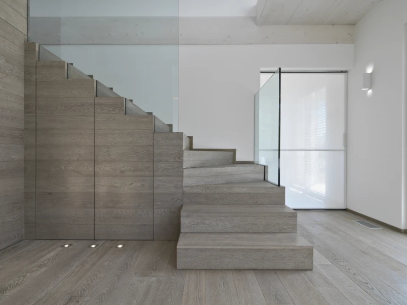 Reforma integral de casa en Vallvidrera - salón minimalista - suelo y escaleras de madera