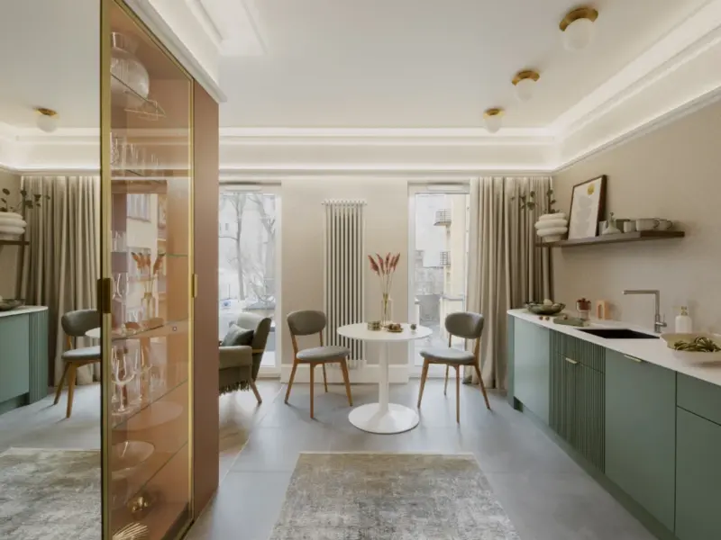 reformas integrales en Pedralbes - Les Corts Barcelona - cocina moderna con mesa redonda para 2 -radiador vertical y muebles con vajillas