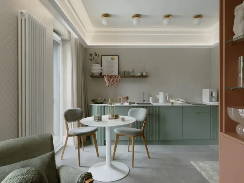 reformas integrales en Pedralbes - Les Corts Barcelona - cocinamoderna con mesa redonda para 2 -encimera y cafetera al fondo